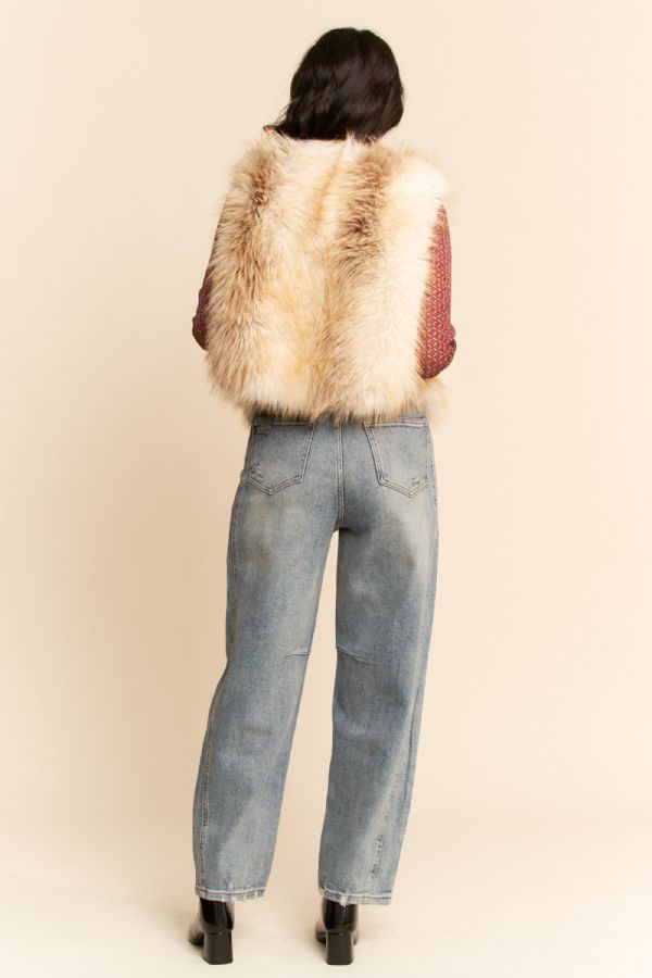 Back view of the white and taupe shaggy faux-fur cropped vest with a full plush panel