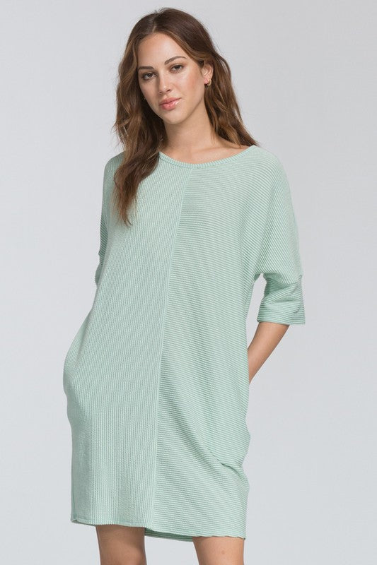 dress knit loose fit round neck three quarter sleeve drop shoulder pockets stretch knit banded sleeves