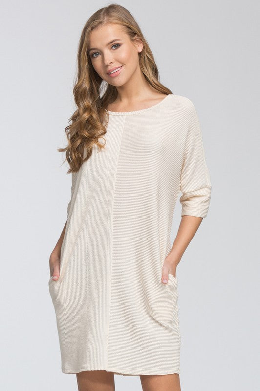 dress knit loose fit round neck three quarter sleeve drop shoulder pockets stretch knit banded sleeves