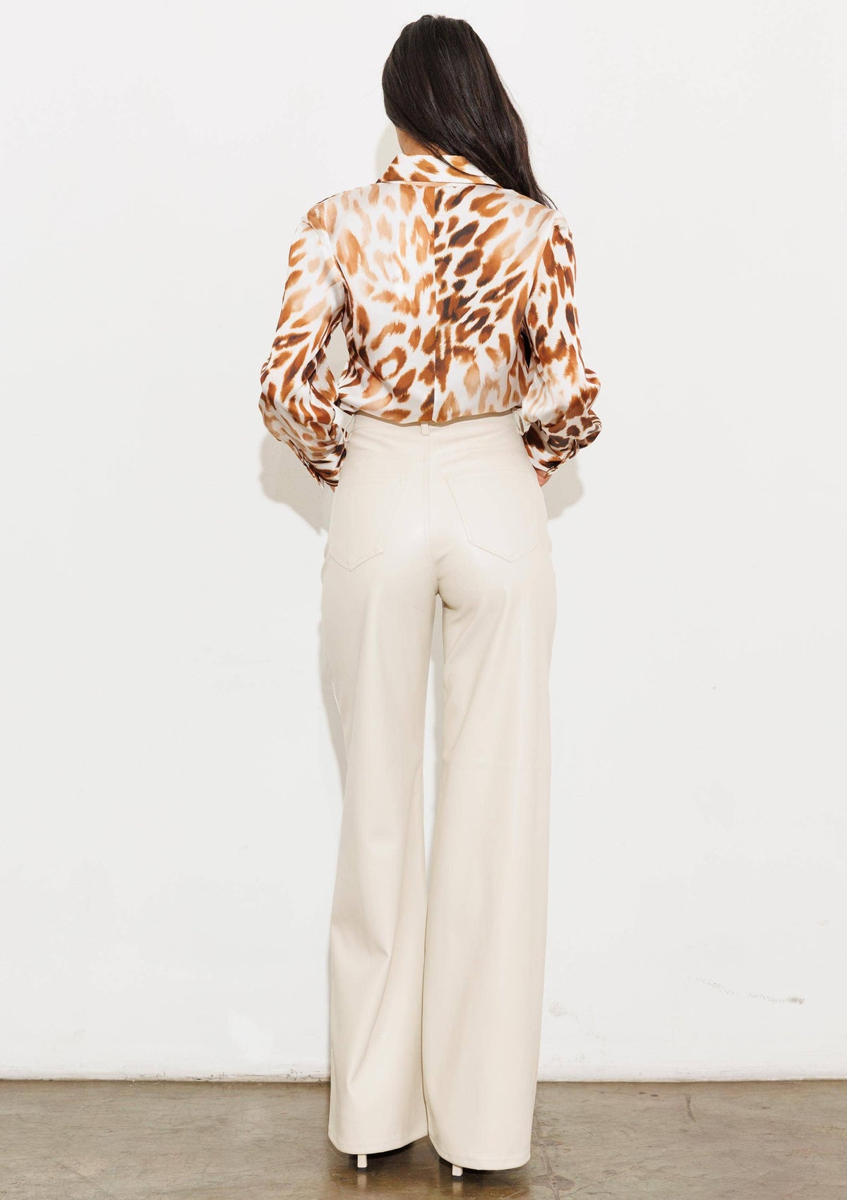 Faux Leather Wide Leg Pants: Black by Vibrant M.i.U