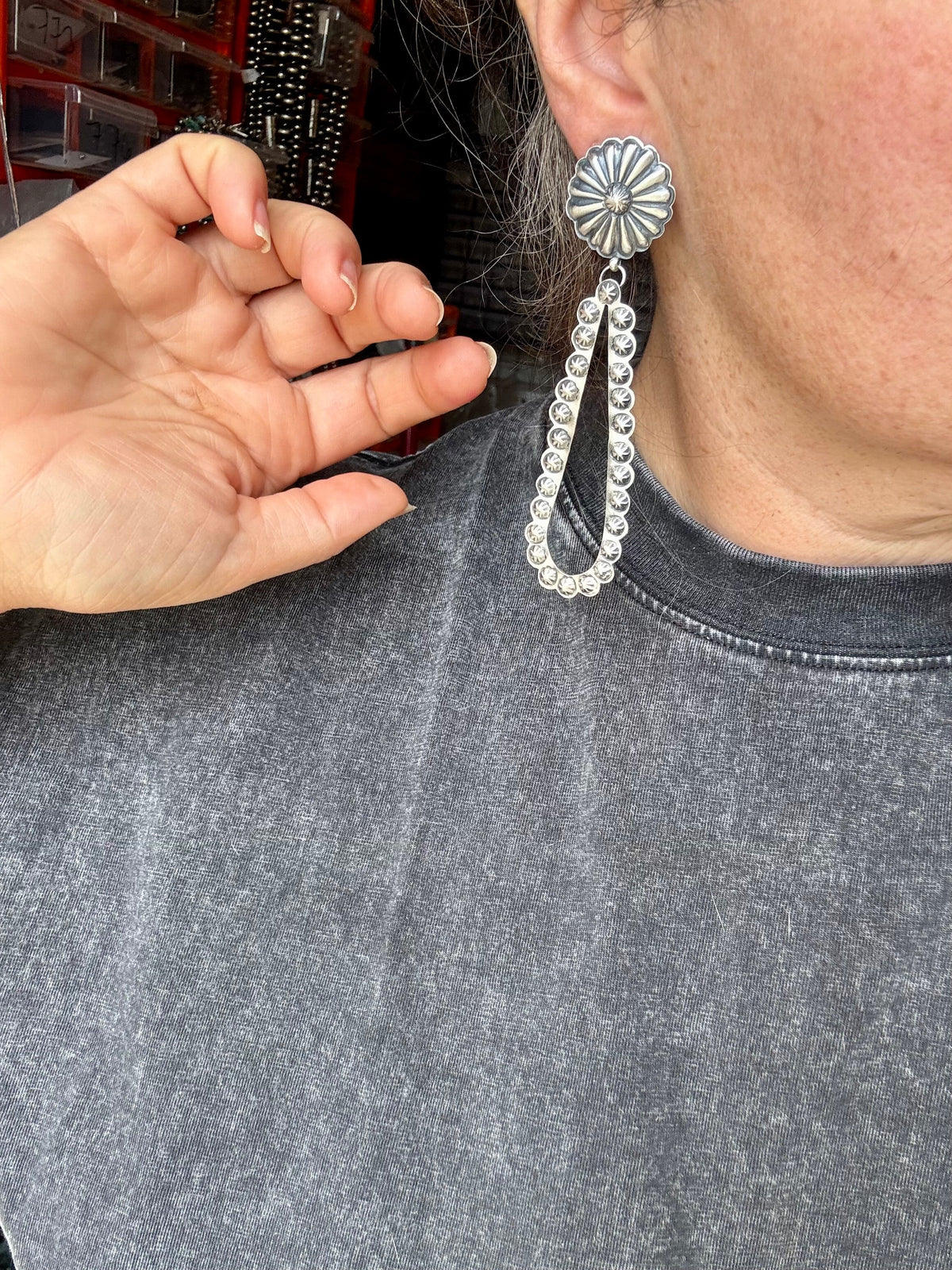 Eugene Charley Navajo Concho & Teardrop Dangle Earrings – Sterling Silver — product photo.
