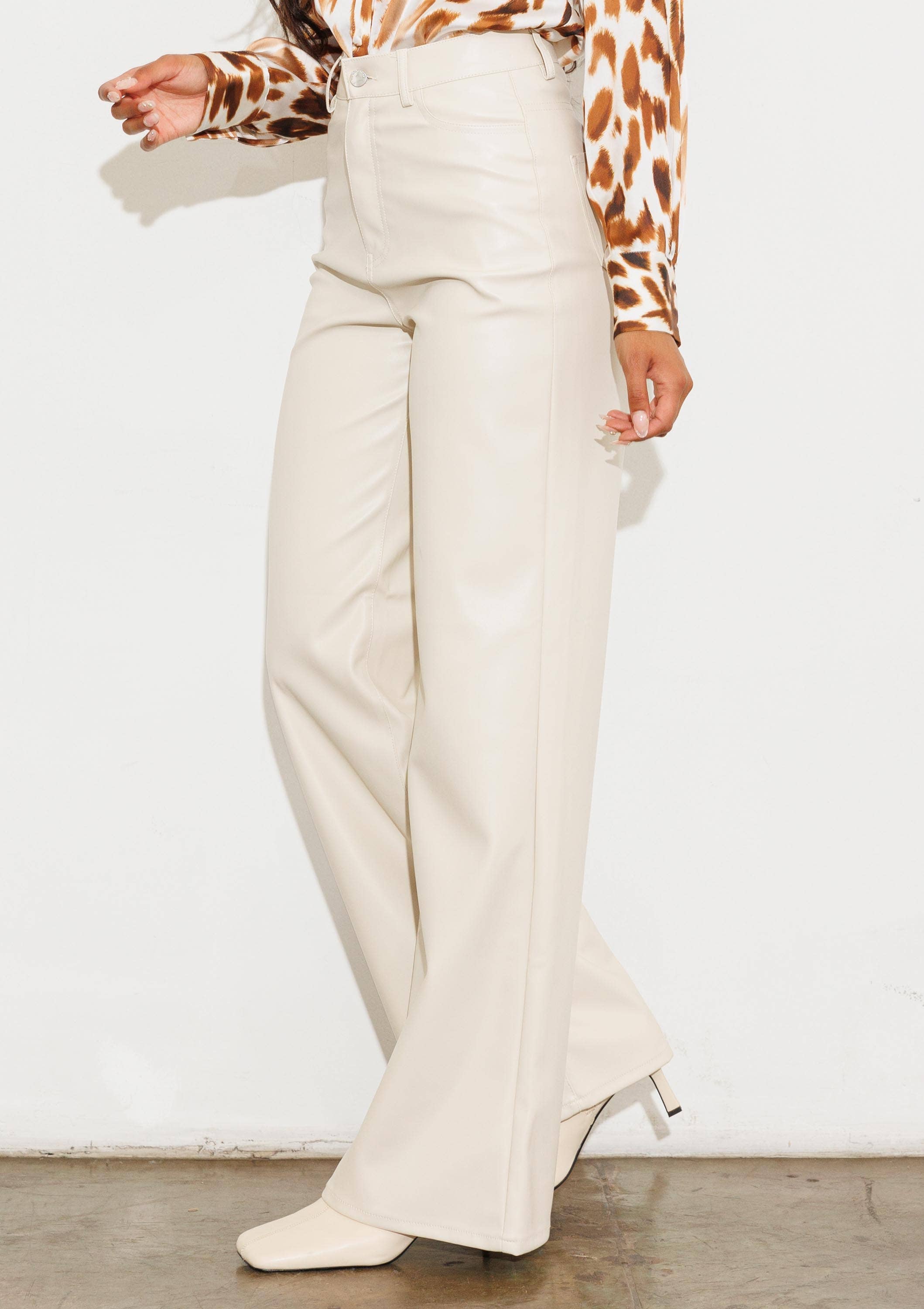 Faux Leather Wide Leg Pants: Black by Vibrant M.i.U