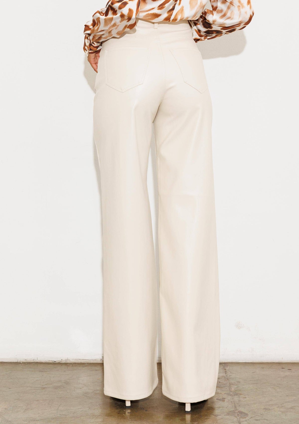 Faux Leather Wide Leg Pants: Black by Vibrant M.i.U