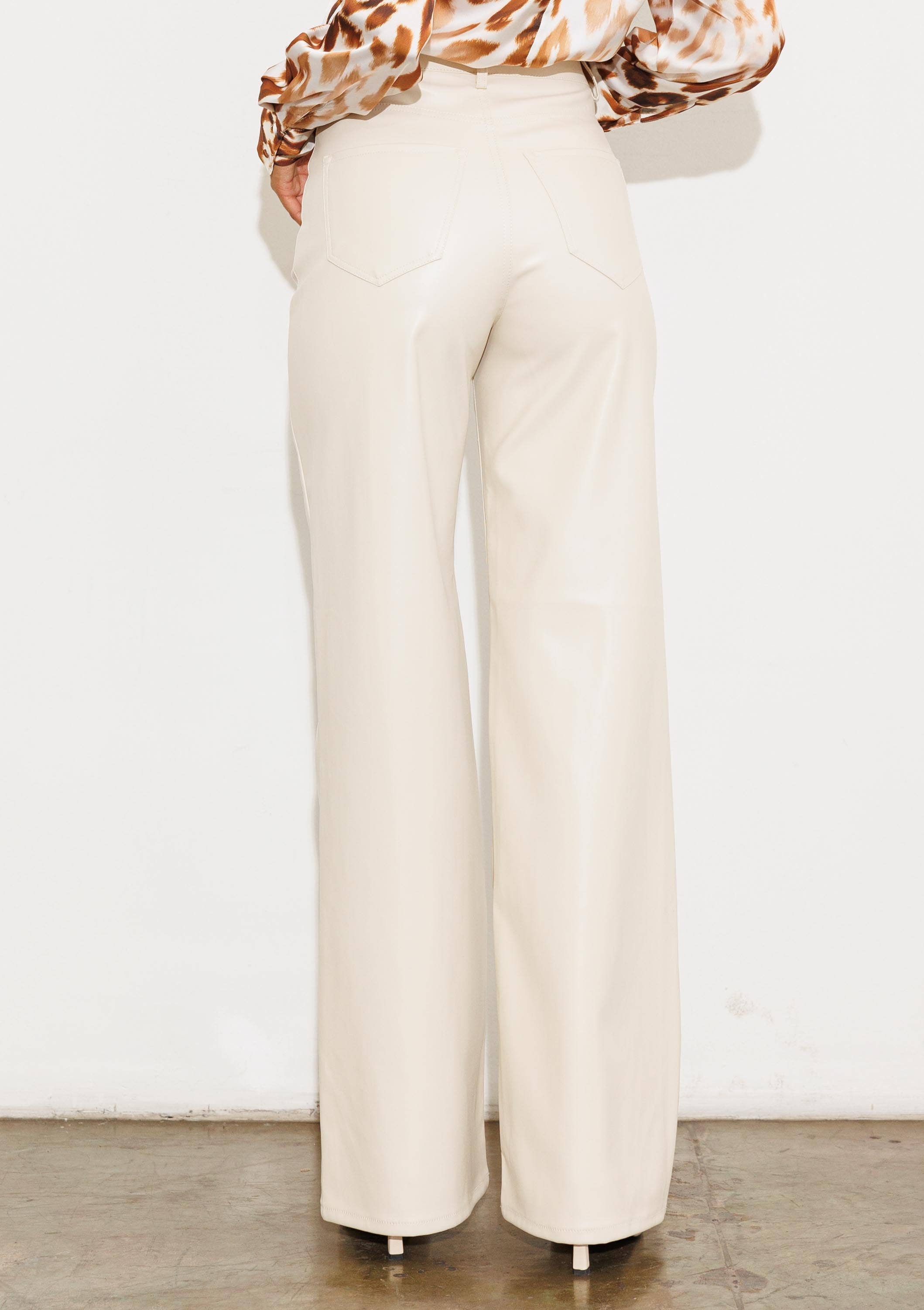 Faux Leather Wide Leg Pants: Black by Vibrant M.i.U