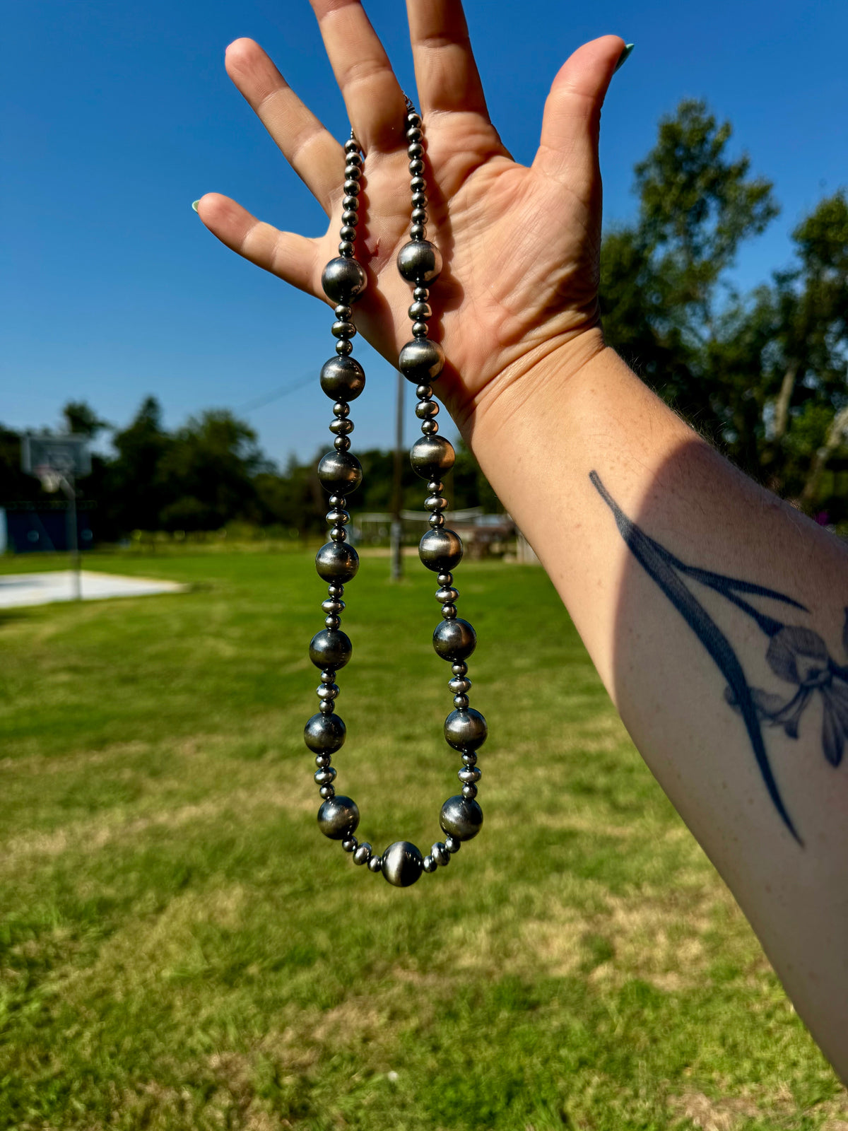 Sterling Silver Pearl Necklace – Mixed Sizes – 23" — product photo.