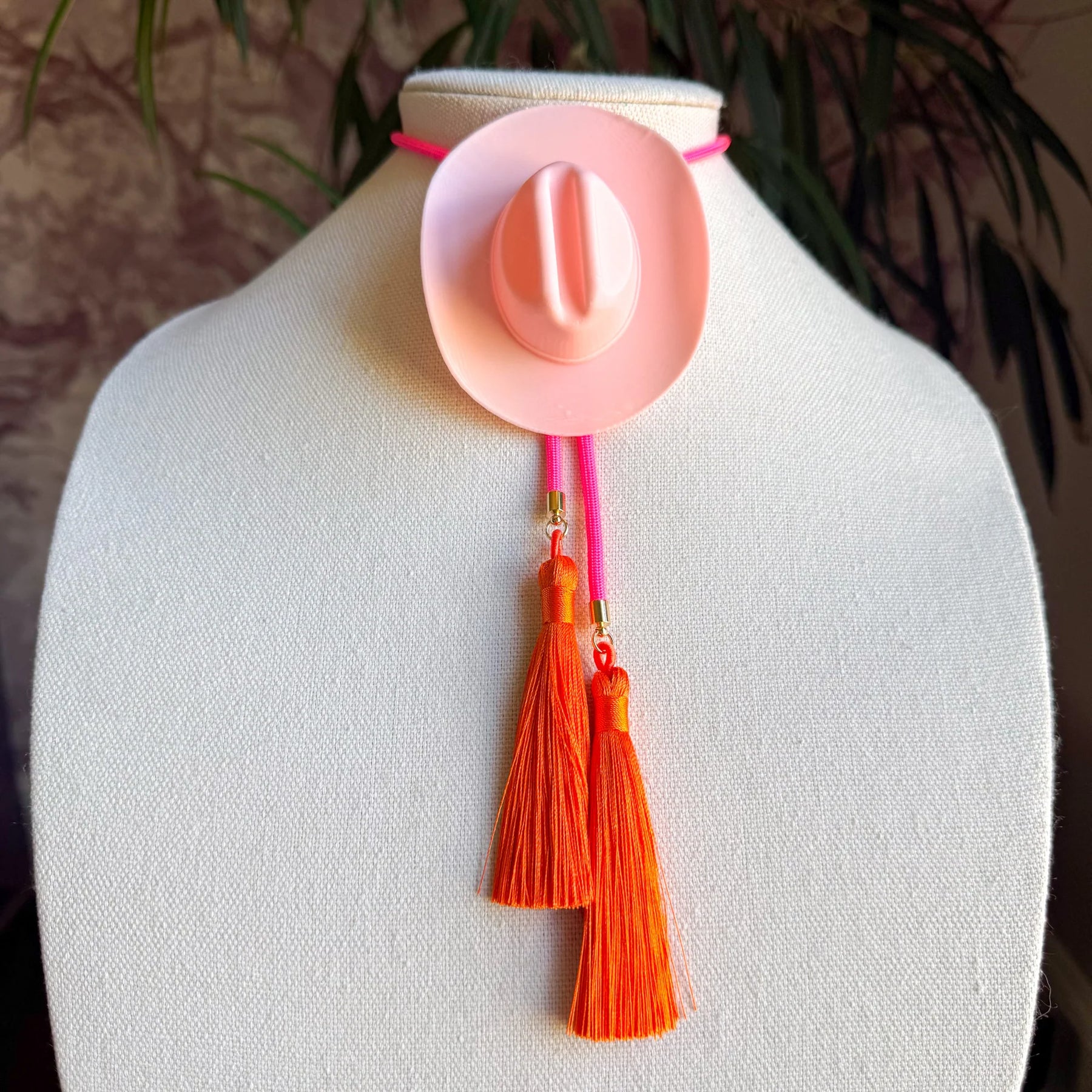 Cowboy Hat Bolo Pink with Orange Tassel
