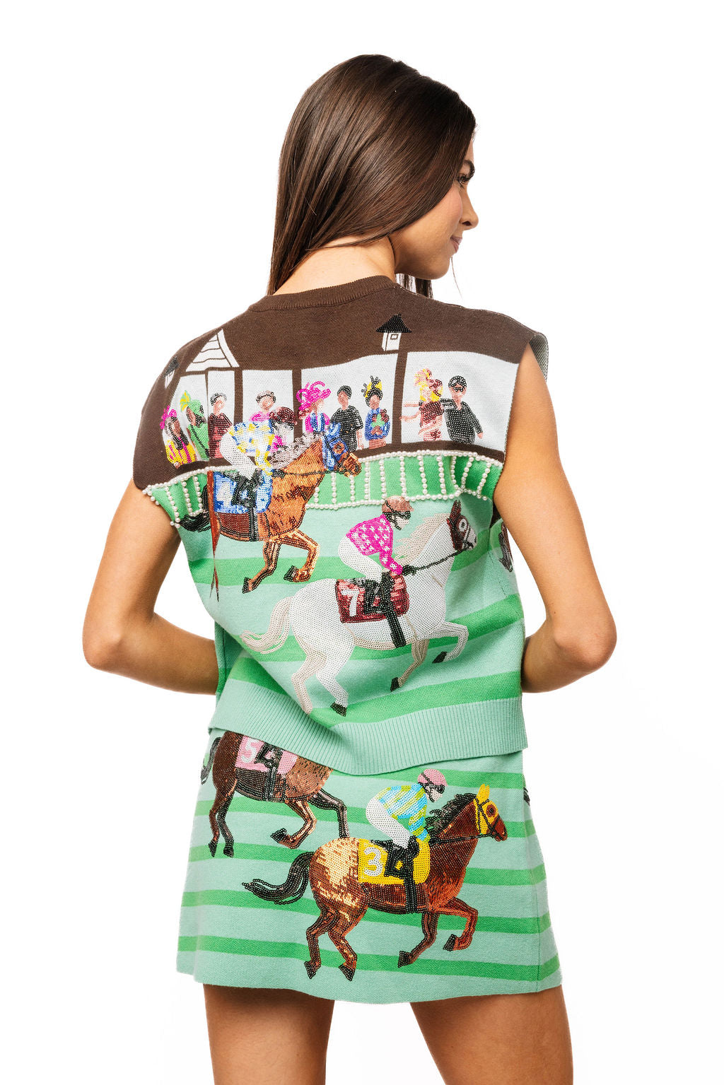 Back view of a model wearing the mint green and brown Queen of Sparkles derby race vest.