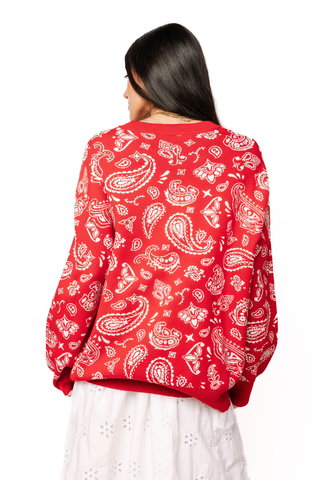 Queen of Sparkles Red & White Paisley Print Cowboy Santa Sweater — back view.