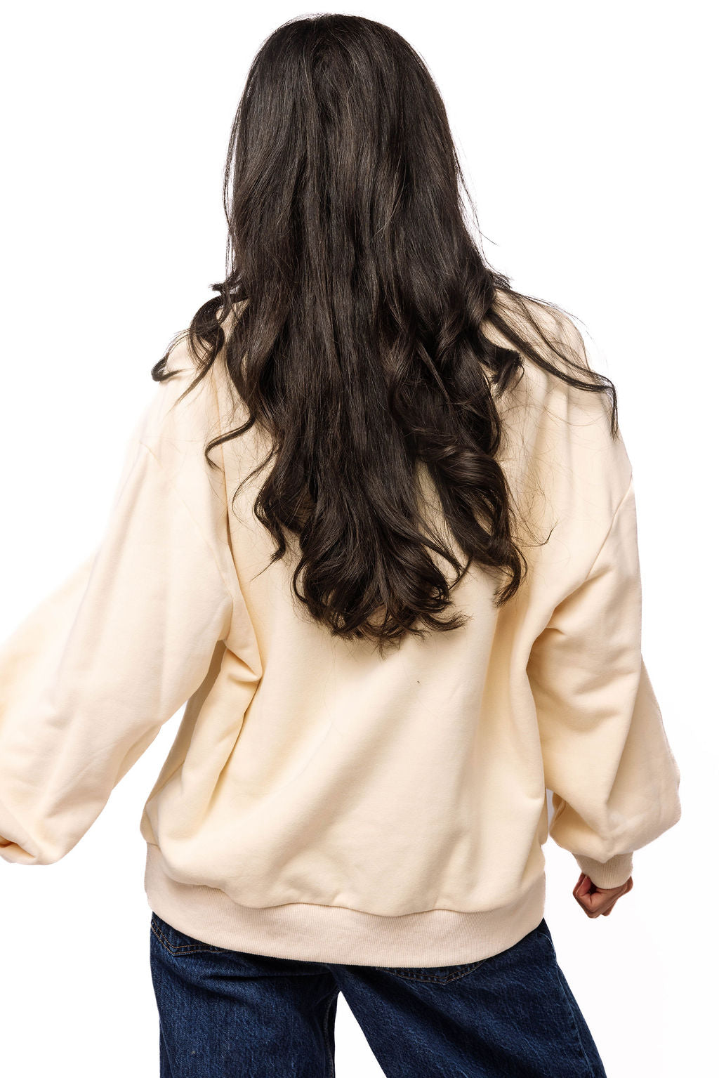 Back view of beige Queen of Sparkles school-books sweatshirt with plain back and ribbed hem