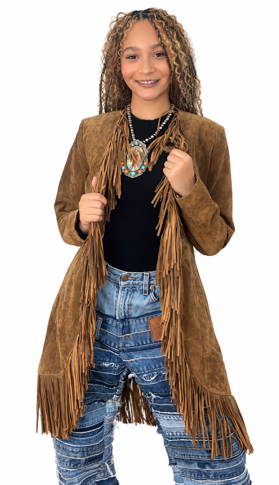 Front view of a model wearing the brown Scully suede duster jacket with long fringe down the front and hem