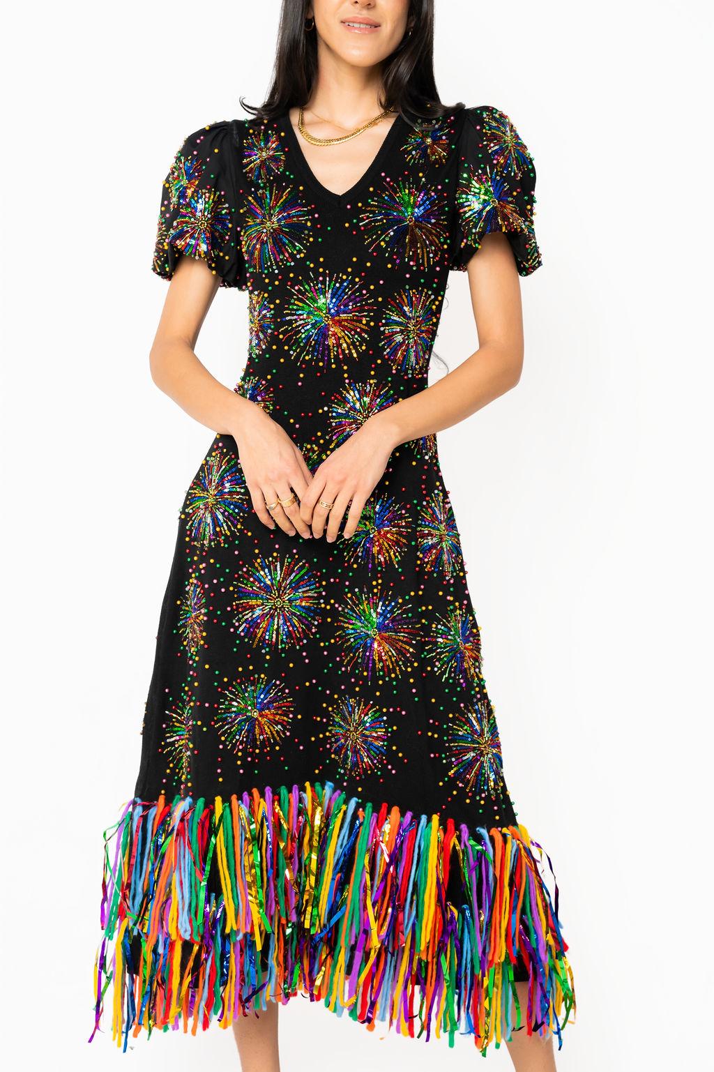 Queen of Sparkles black knit midi dress with multicolored firework design and fringe detailing, front view