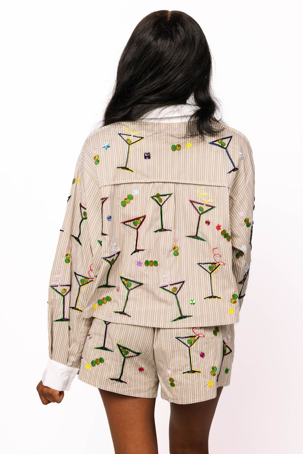 Back view of the Queen of Sparkles cream pinstriped top with colorful martini-glass embellishments.