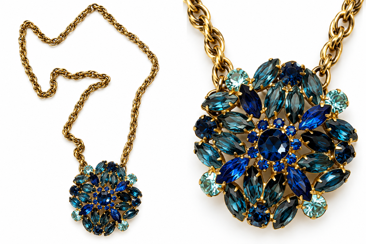 One-of-a-kind gold-tone chain necklace featuring a repurposed vintage brooch with sapphire-blue, teal and aqua rhinestones.