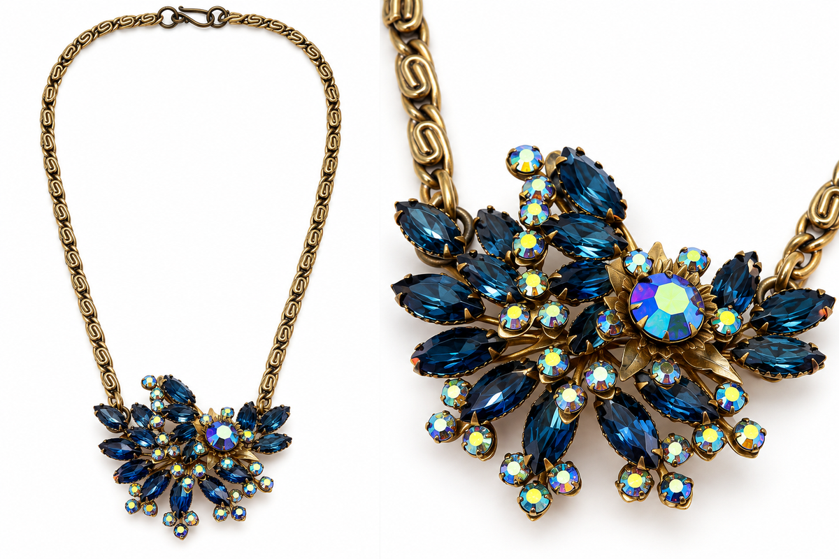 One-of-a-kind gold-tone chain necklace with repurposed vintage sapphire-blue rhinestone brooch and iridescent crystal accents.